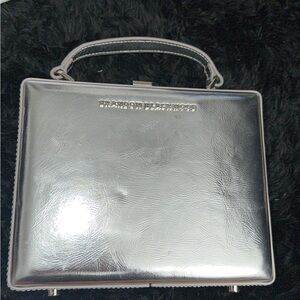 Brandon Blackwood Metallic trunk